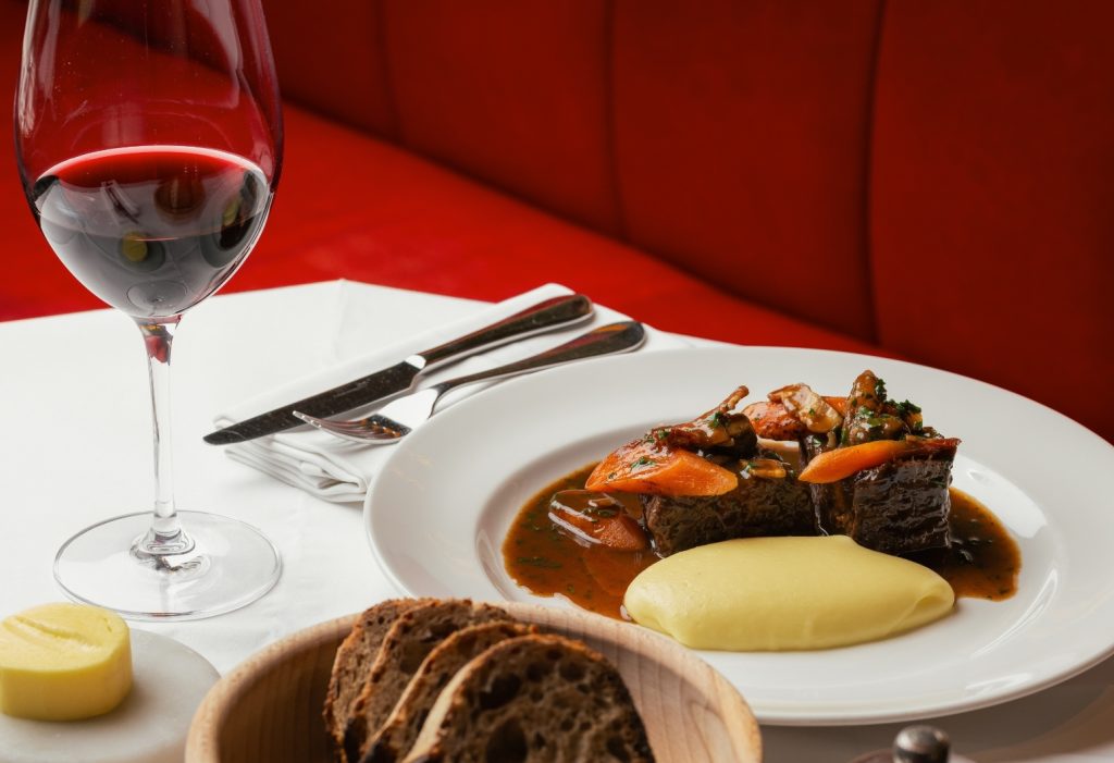 Braised meat with mashed potato, vegetables and red wine at Bistrot at Wild Honey