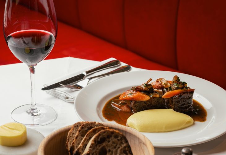 Braised meat with mashed potato, vegetables and red wine at Bistrot at Wild Honey
