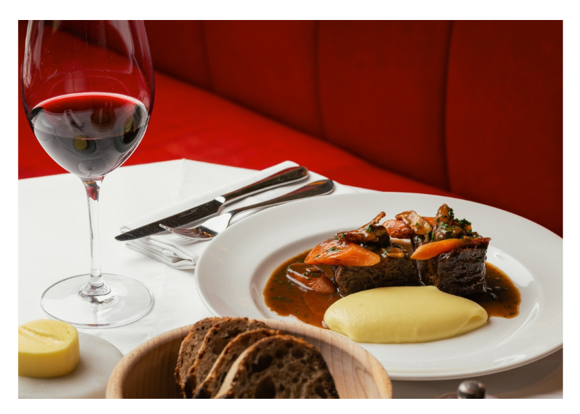 Braised meat with mashed potato, vegetables and red wine at Bistrot at Wild Honey